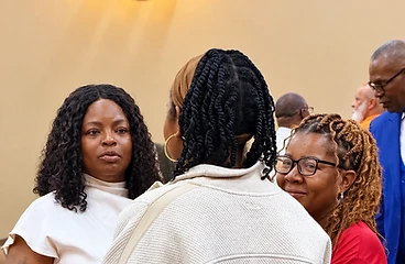 Church members gathered in fellowship and conversation