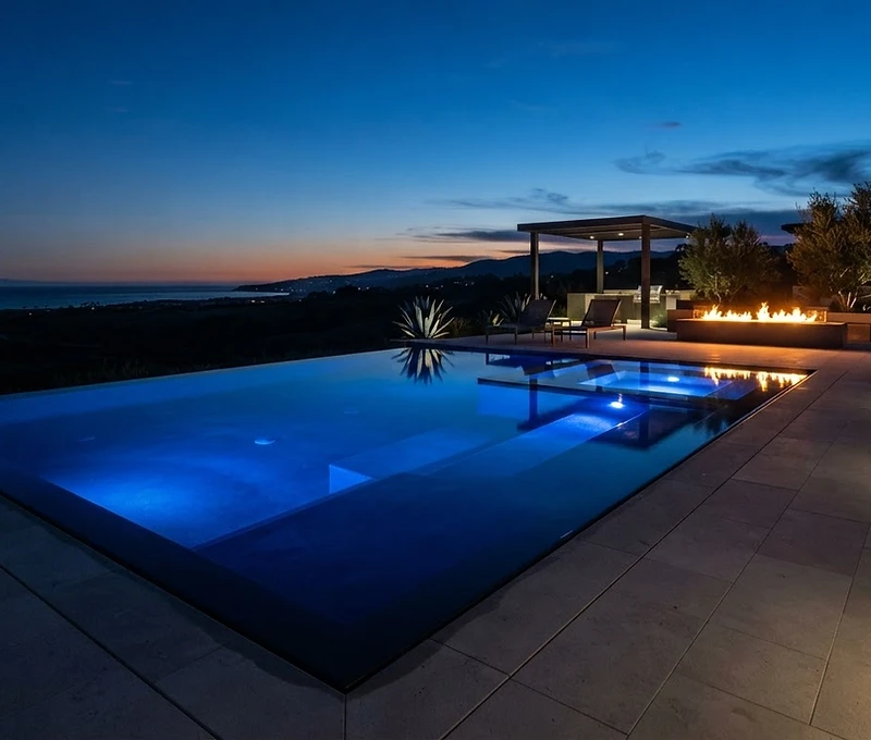 Luxury custom gunite pool at twilight