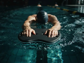 Concept visualization of a swimmer holding FlowSense in the pool