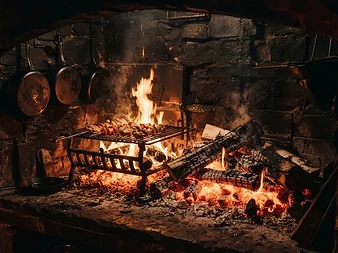 A glowing, ash-edged carpet of embers raked into heat zones