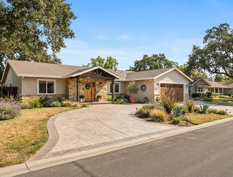 Stamped concrete driveway at a ranch-style home