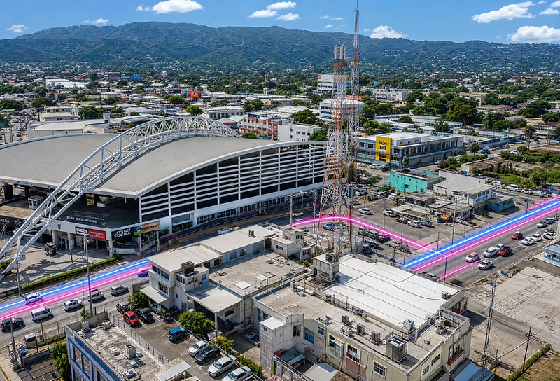 Aerial view of Kingston with neon light trails over the road network