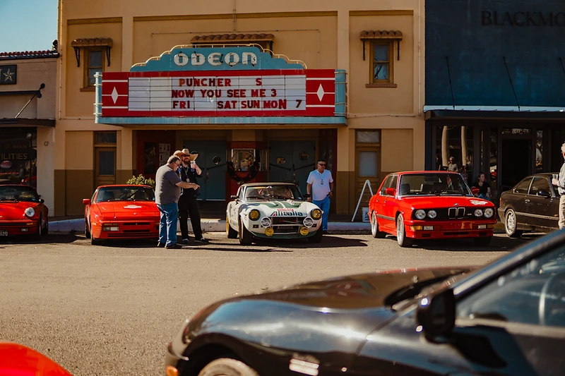 Drivers gathered with their vintage cars