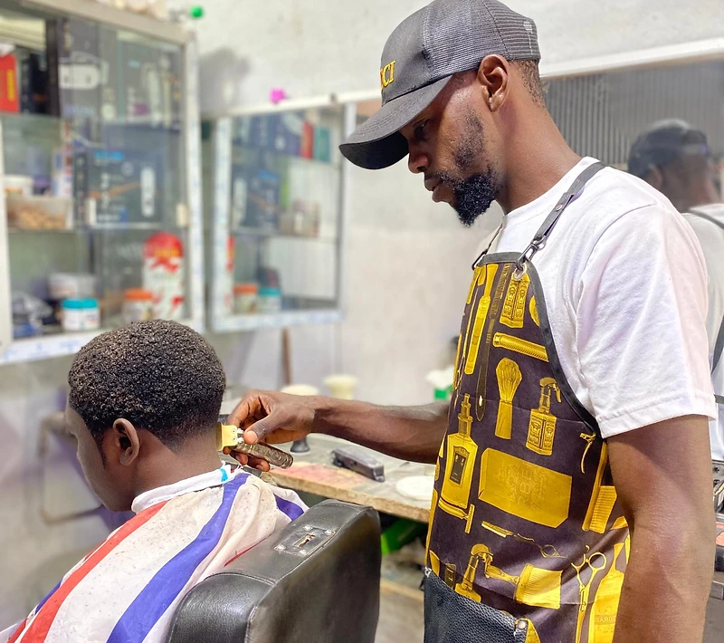Nezer's Haircut 237 — professional barber grooming a client