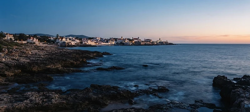 Atlantic coastline at twilight — local property oversight for international owners by The Cascais House Company