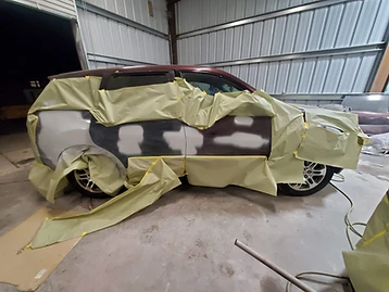 Maroon SUV Quarter Panel Paint Repair