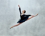 Ballerina in a grand jeté mid-air