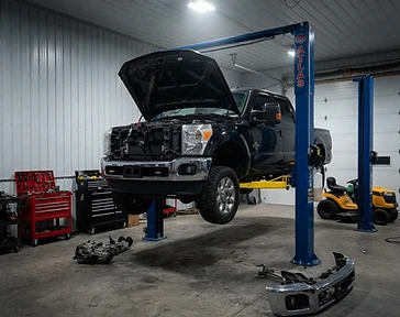 Two-post lift bay