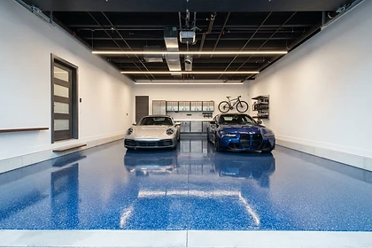 After: Sample garage floor coating with grey epoxy flake and polyaspartic topcoat