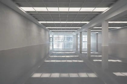 After: Sample shop floor coating with decorative flake and polyaspartic finish