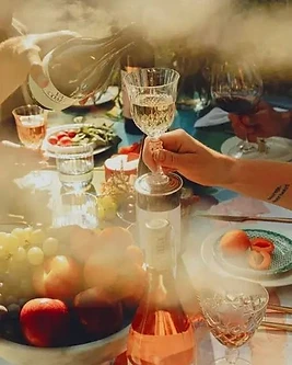 A backlit toast over a sun-drenched table