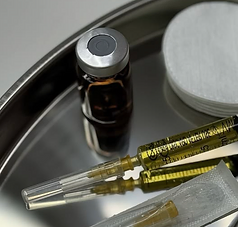 Physician grade vial and syringe on a medical tray