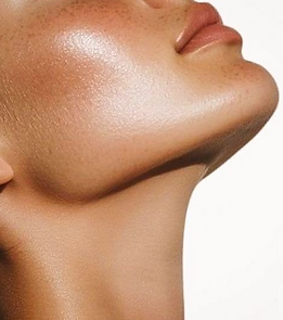 Editorial before-and-after profile showing skin transformation