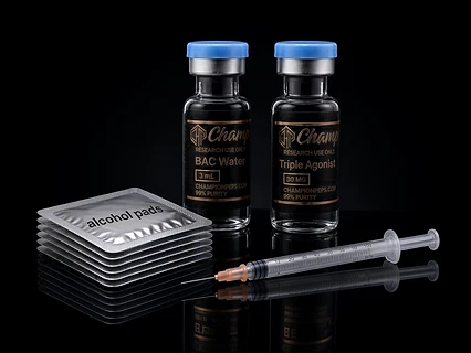 BAC water and 30mg Triple Agonist peptide vial, alcohol pads, and syringe — reconstitution reference