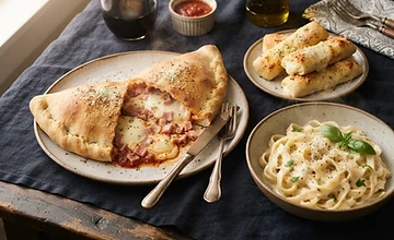 Calzone, pasta y palitroques con queso de El Puerto San Jorge