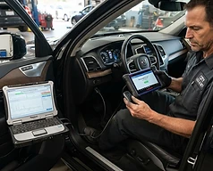 Locksmith programming a car key fob for a driver in Centennial, CO