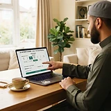 A parent booking a free trial lesson on a laptop showing a booking calendar