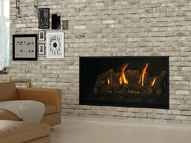 Kozy Heat Bellingham 44 gas fireplace set into a light beige brick wall