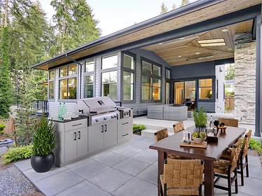 American Outdoor Grill stainless steel grill built into an outdoor kitchen island