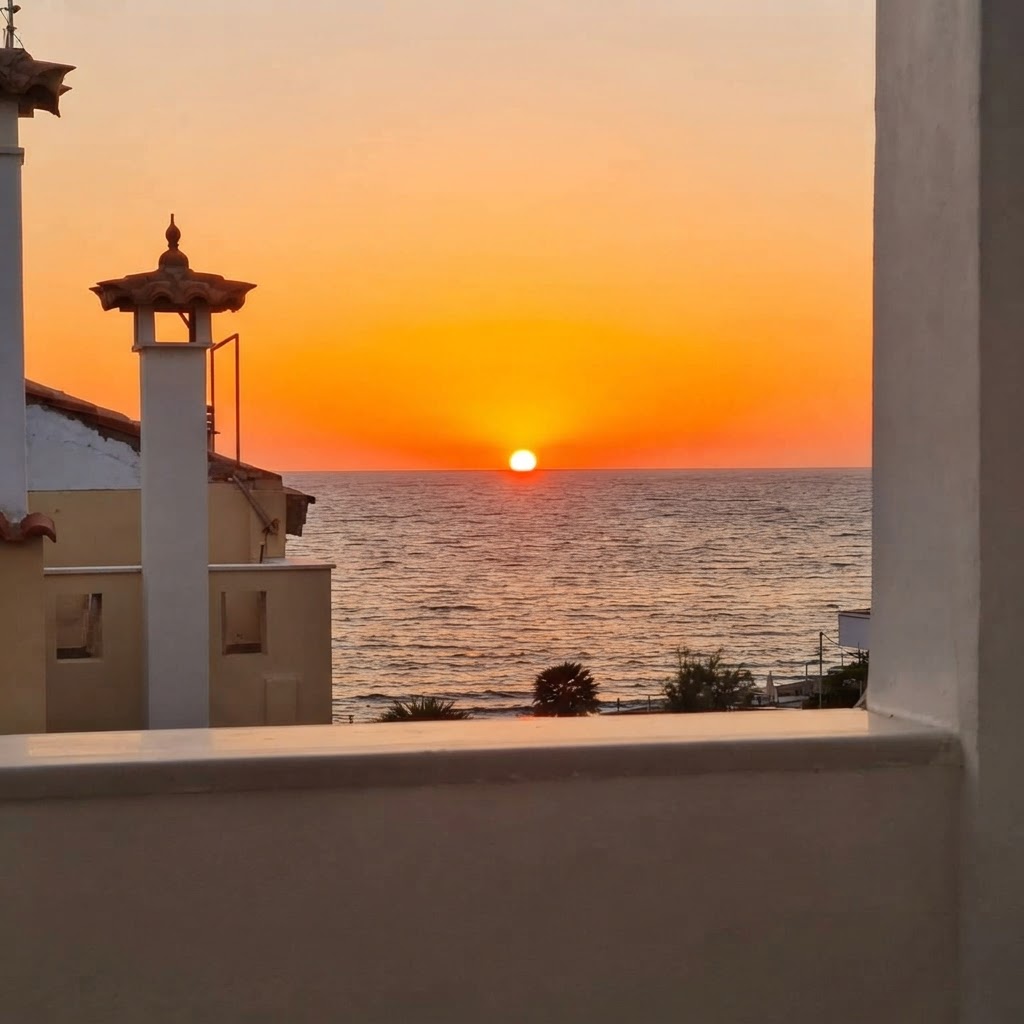Sunset over the sea from the terrace
