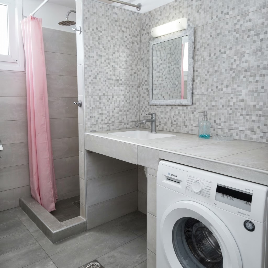 Bathroom with shower, vanity & washing machine