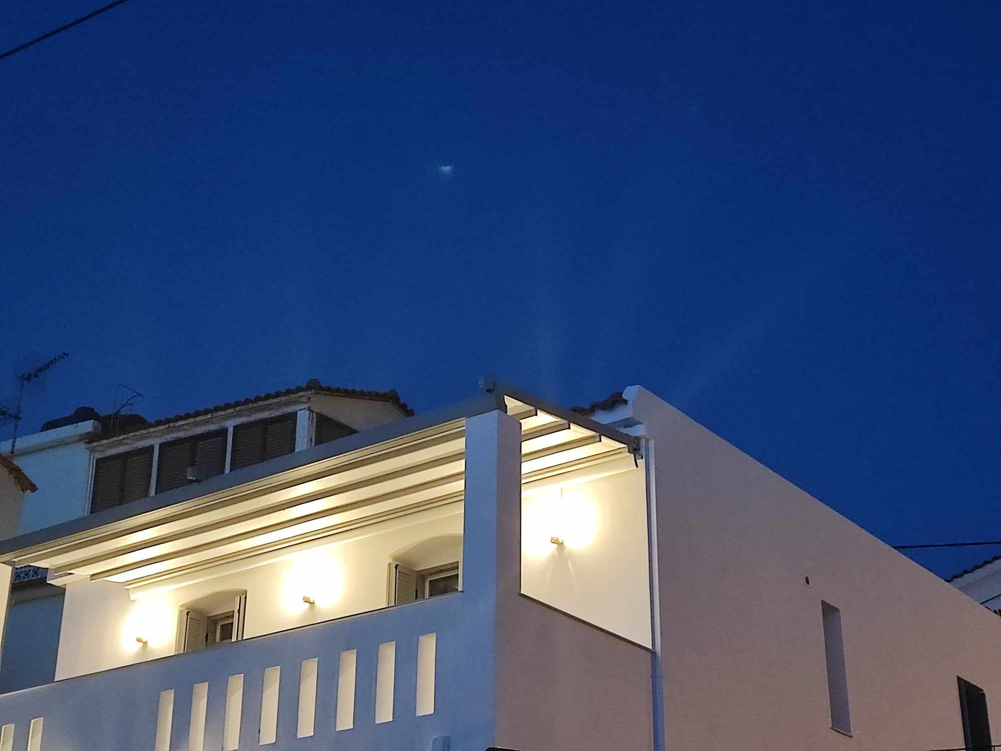 The building at dusk