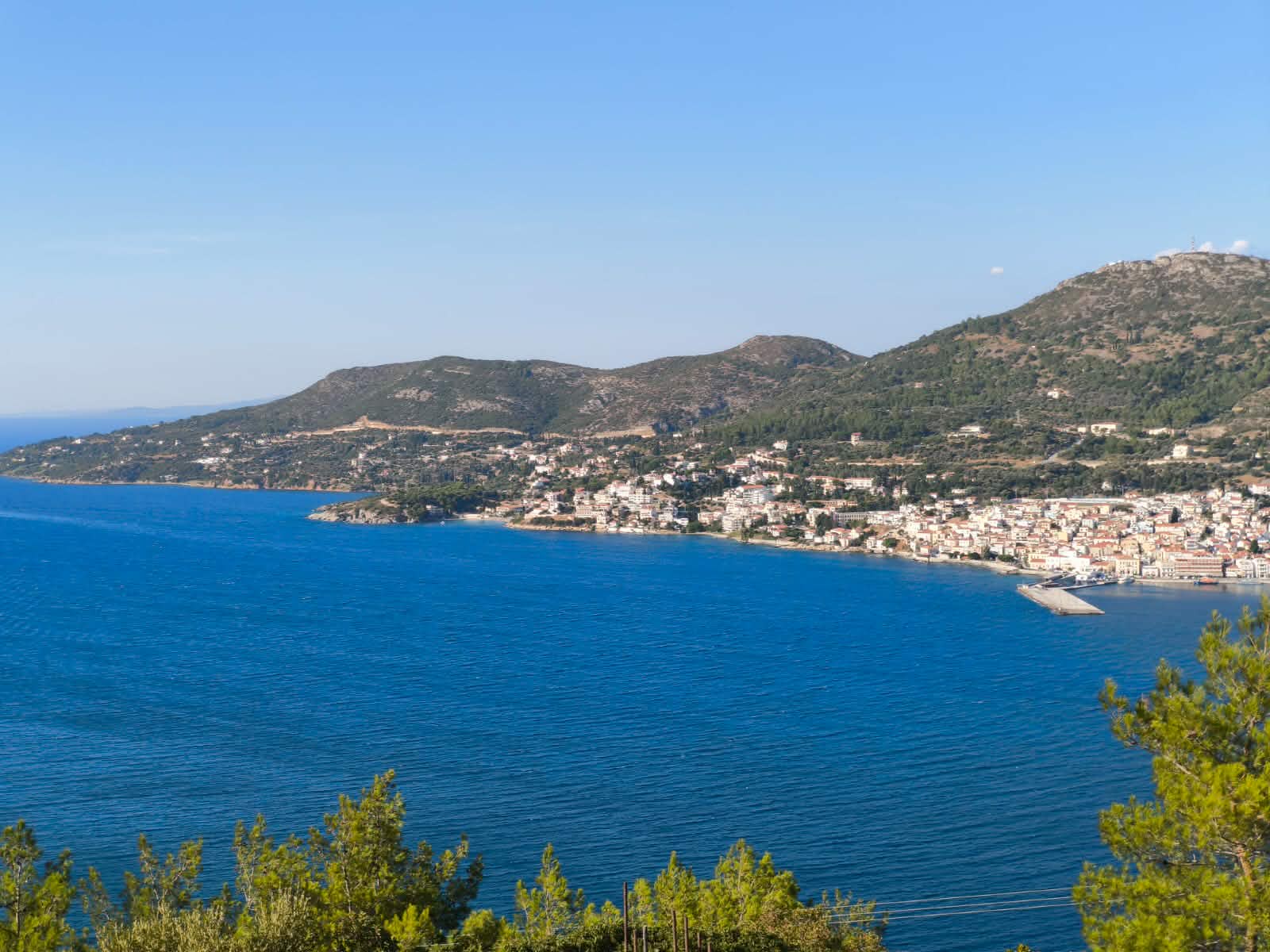 Panoramic bay with ferry & hillside town