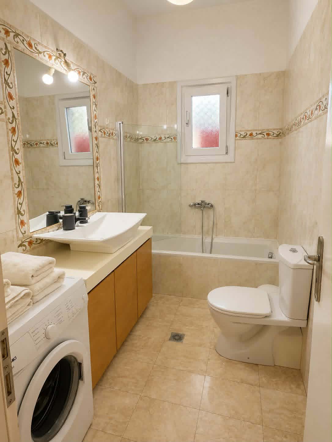 Bathroom with bathtub, shower & vanity