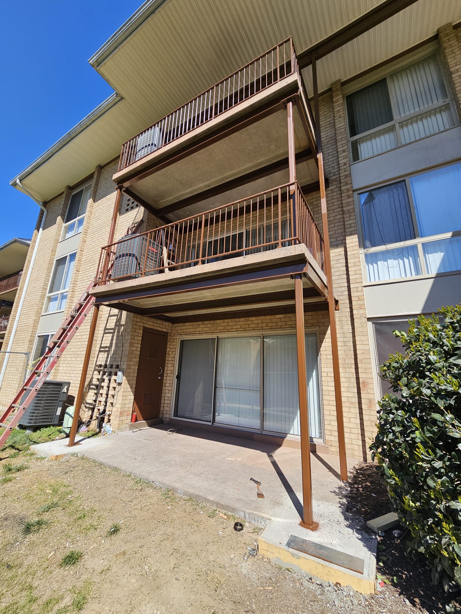 Apartment balcony structural restoration in progress