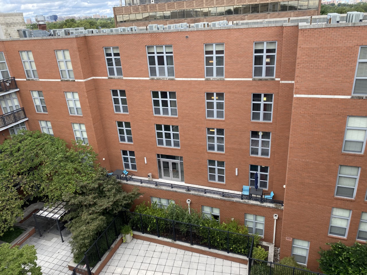 Multi-story brick apartment building exterior