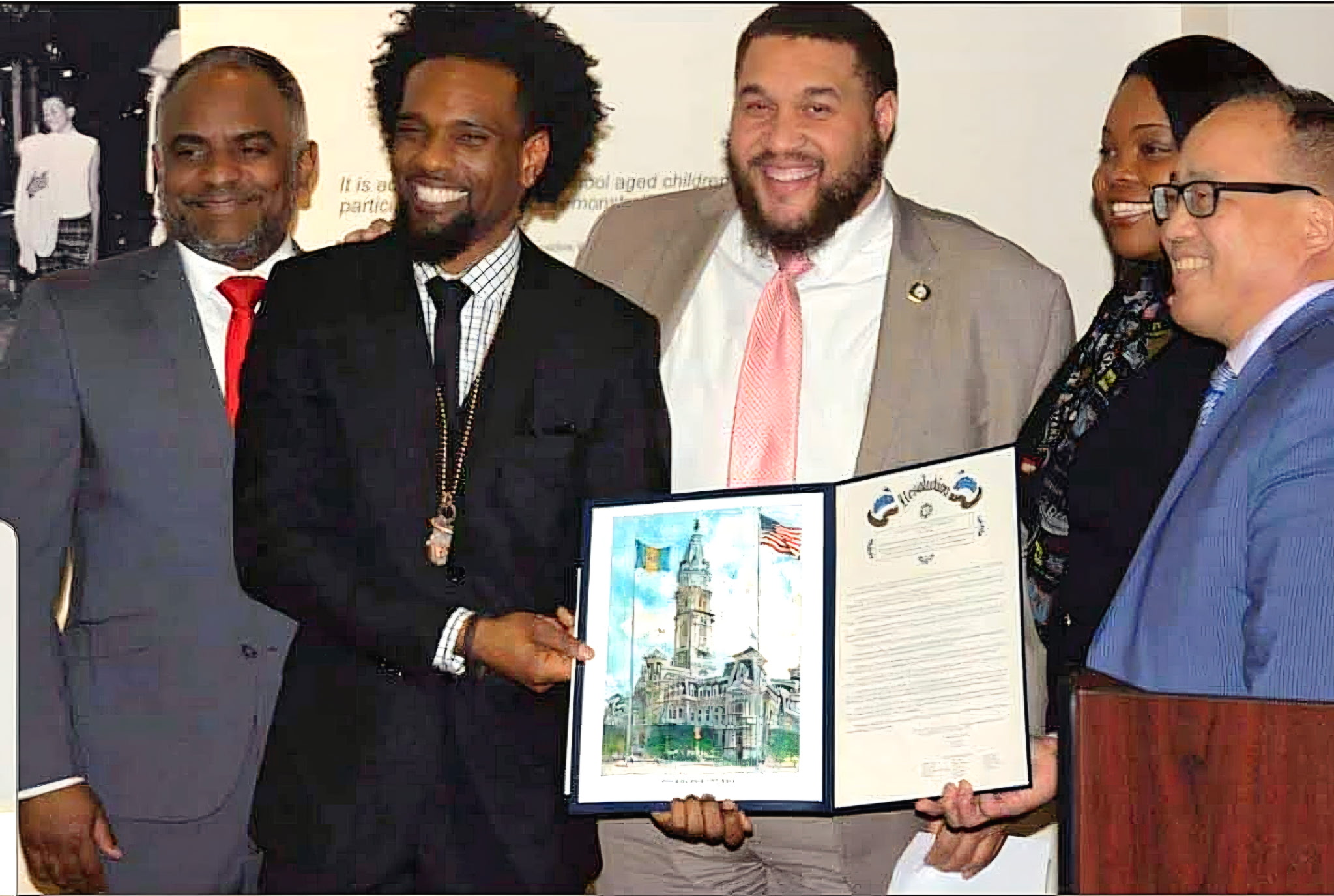 Nathaniel Pyfrom and fellow honorees holding the City Council resolution at W.E.B. DuBois Day