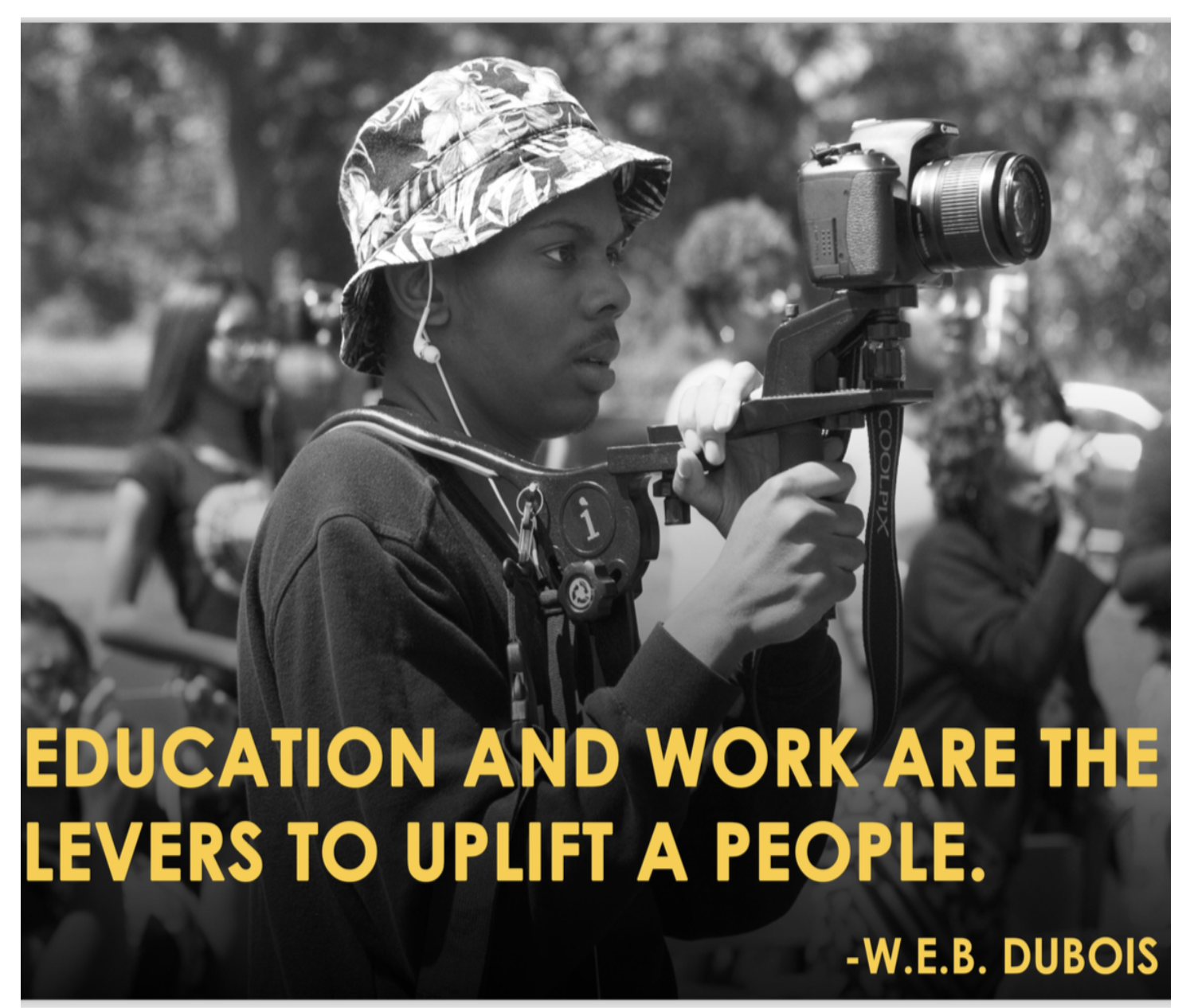 Young filmmaker with camera, the cohort in action