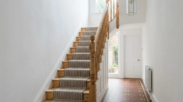 Freshly plastered hallway and staircase in a Victorian terraced house