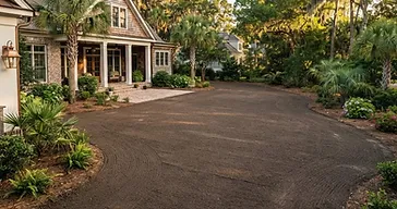 Southern Lowcountry yard with sod removed and bare soil regraded and leveled for new sod, no people, no equipment