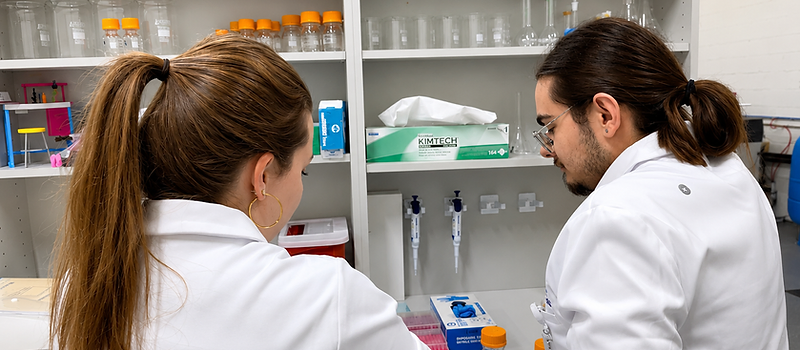 Cadence technicians working at the laboratory bench
