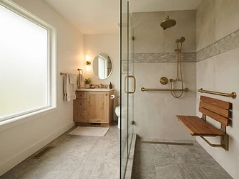 Accessible South Florida home bathroom with step-free shower, grab bars and non-slip flooring