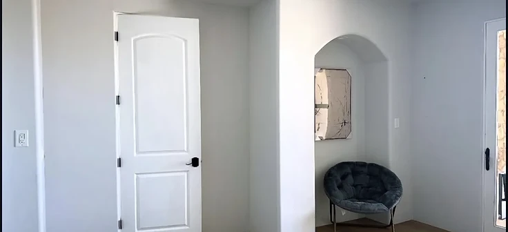 Finished drywall with arched alcove