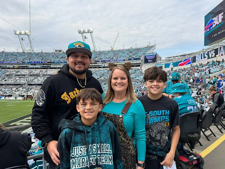 The Grime Scene Unit family at a Jaguars game in Northeast Florida