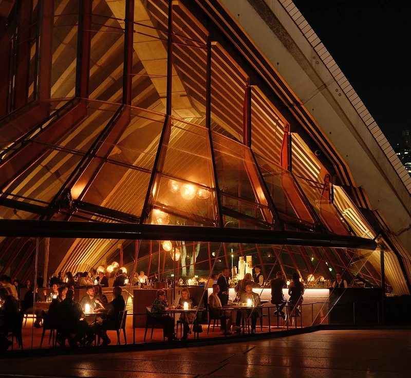 Sydney harbourside dining illuminated at night