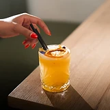 Old fashioned with dehydrated orange