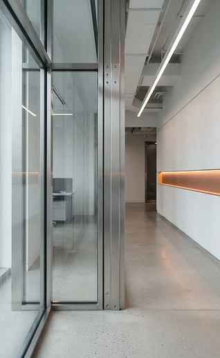 A modern facility corridor with clean structural lines