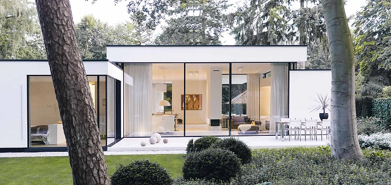 Minimal-frame sliding glass doors in a contemporary architectural extension