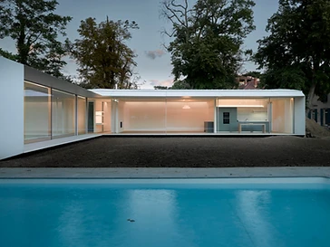 Sliding doors at dusk, the kind of project a glazing quotation covers