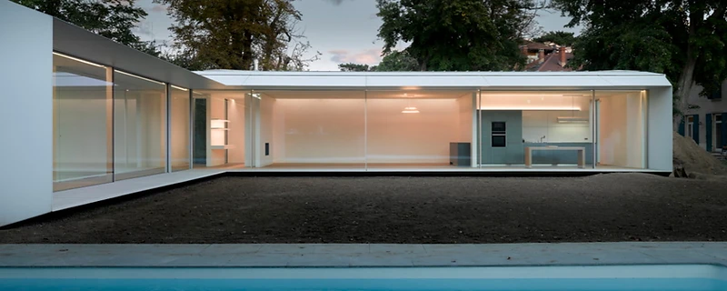 Sliding doors at dusk, the kind of project a glazing quotation covers