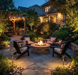 Patio fire pit seating area with landscape lighting