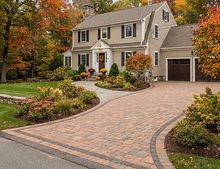 Paver driveway with decorative stone border
