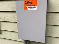 Labeled disconnect with branded emergency-service sticker