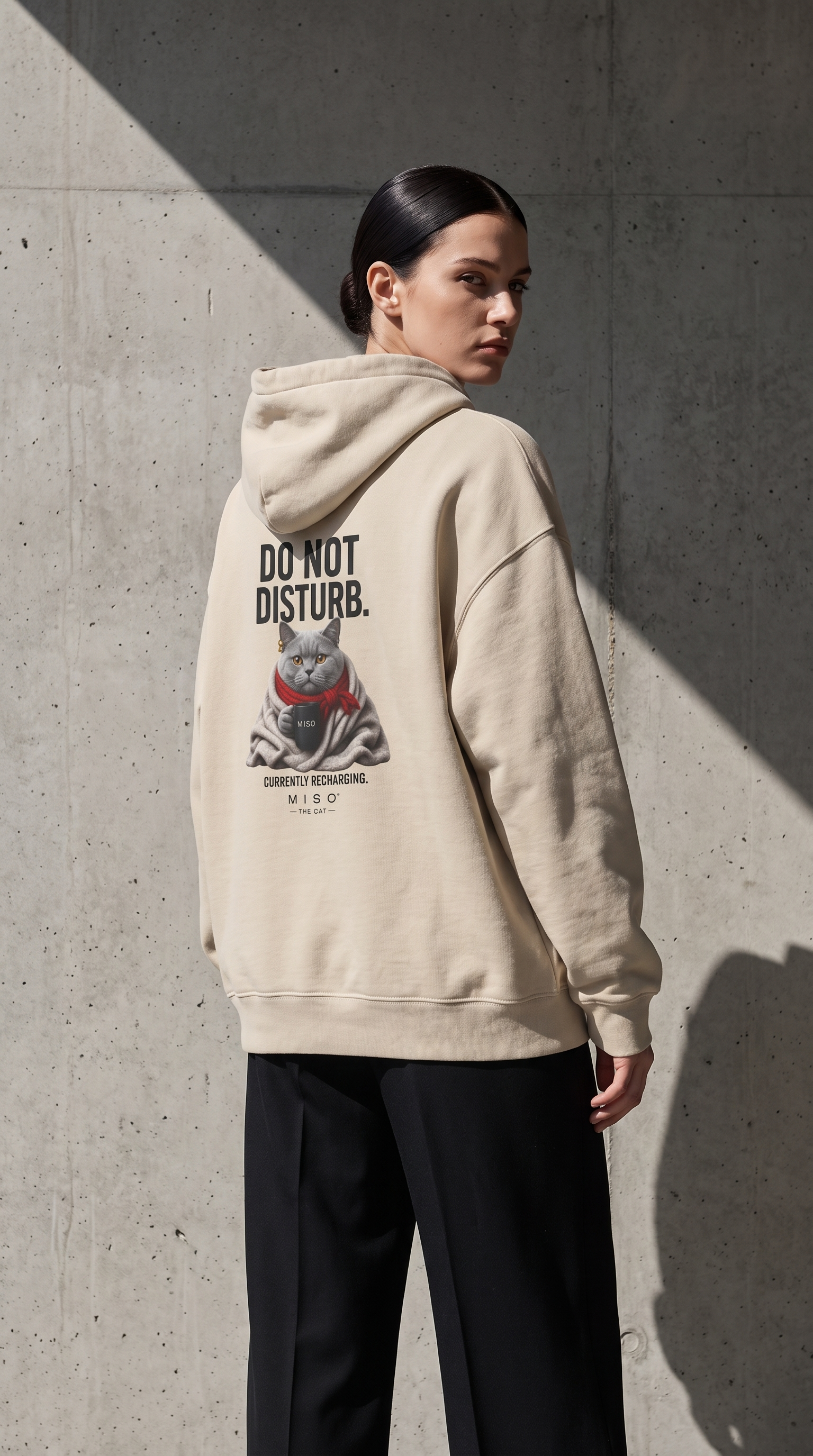 Woman wearing MISO Do Not Disturb hoodie