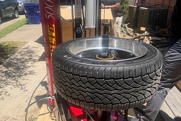 Professional tire mounting equipment in action