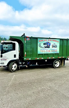 Dump Day junk removal truck — side profile